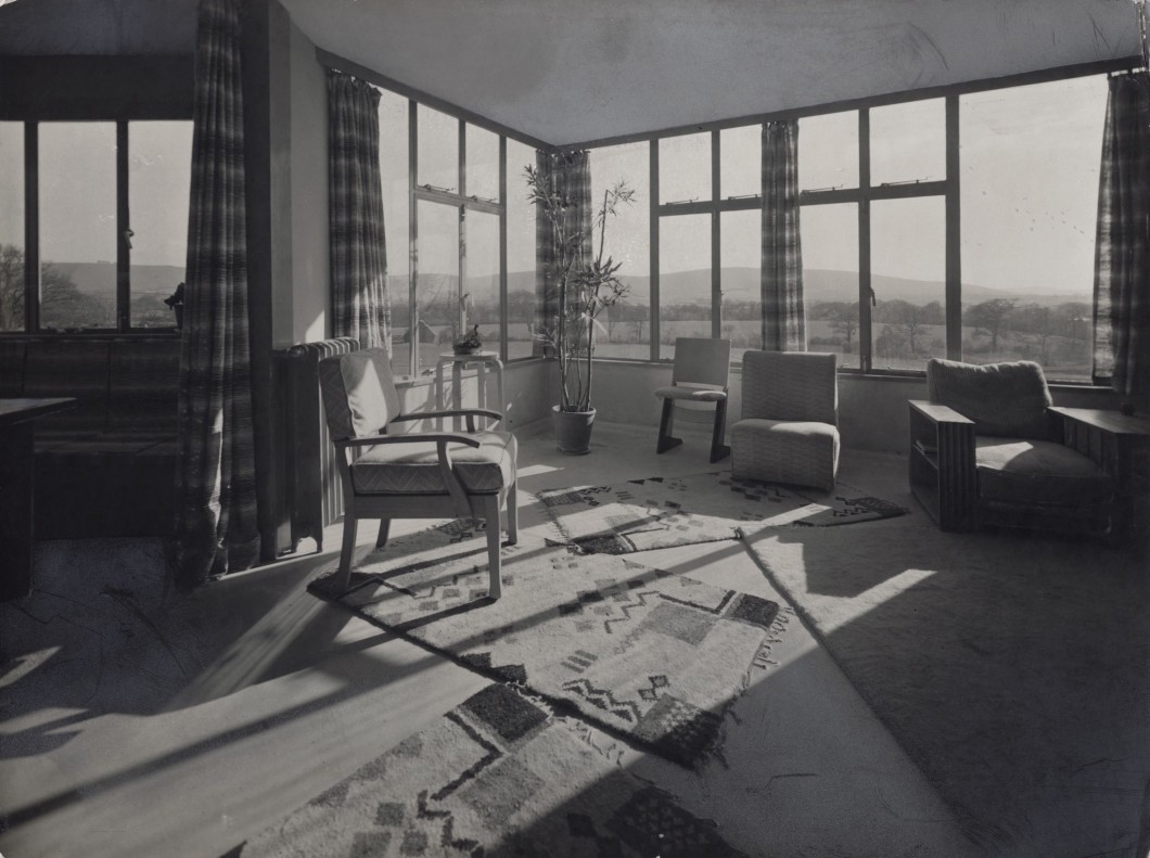 Interior with large windows and arm chair