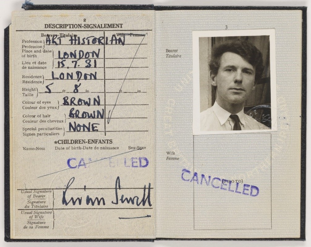 A passport of a man dated 1963 open to show the photograph page.