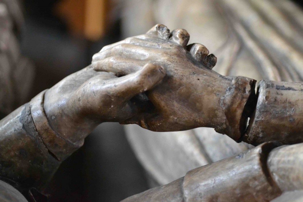 Detail of sculpted clasped hands